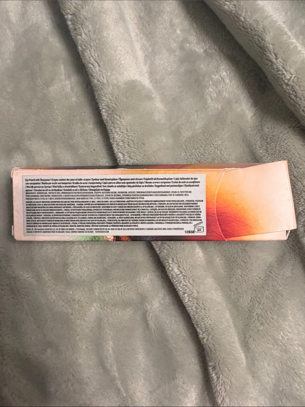 Paw Patrol Eyeliner Packaging with Blue Green Orange Accents